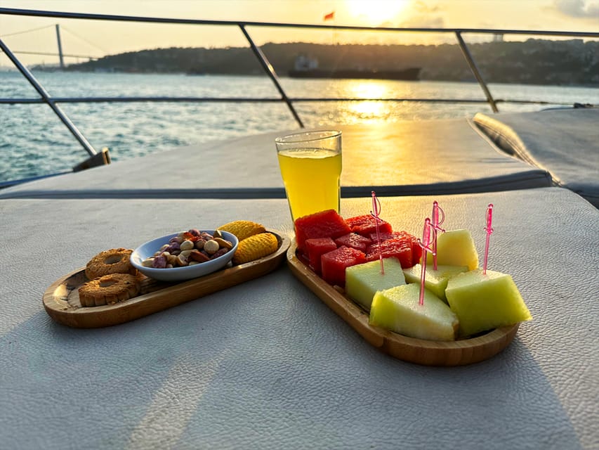 Istanbul: Bosphorus and Golden Horn Sunset Yacht Cruise - Dolmabahçe Palace and Ortaköy Mosque, the part where the skyline starts to click