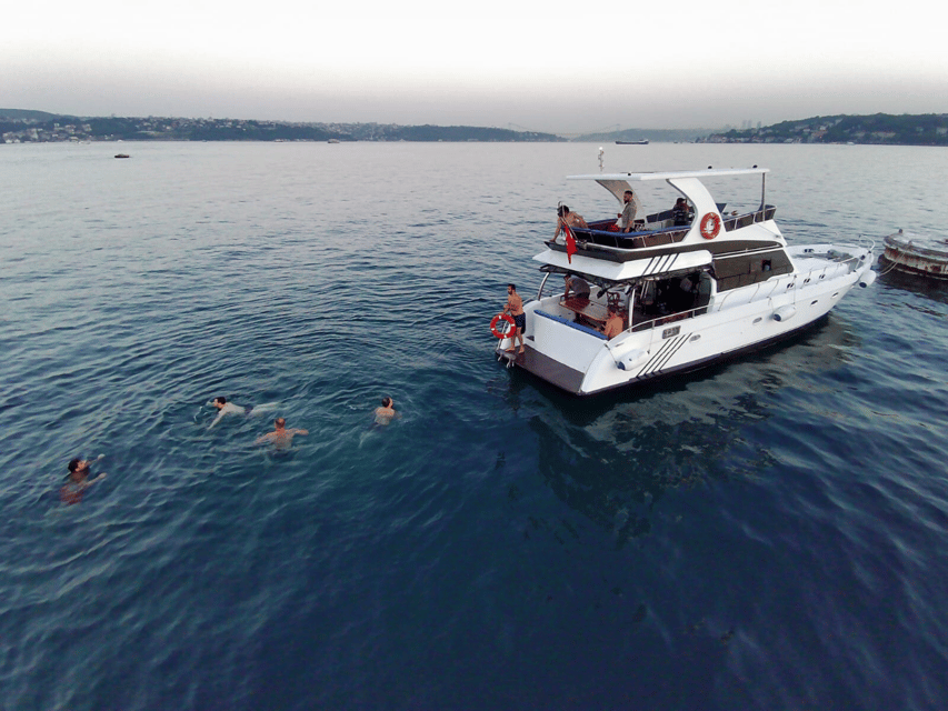 Istanbul: Private Yacht Organization on Bosphorus (14 Meter) - Inside the yacht: sunshade, cabins, and that front-deck sunbathing zone