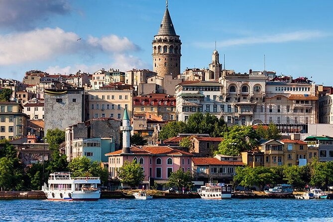Sunset Cruise with Stop along Asia: Discover Istanbul's Bosphorus - Passing under the Bosphorus Bridge at night light speed
